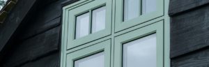 Double glazed flush sash casement windows in Chartwell green